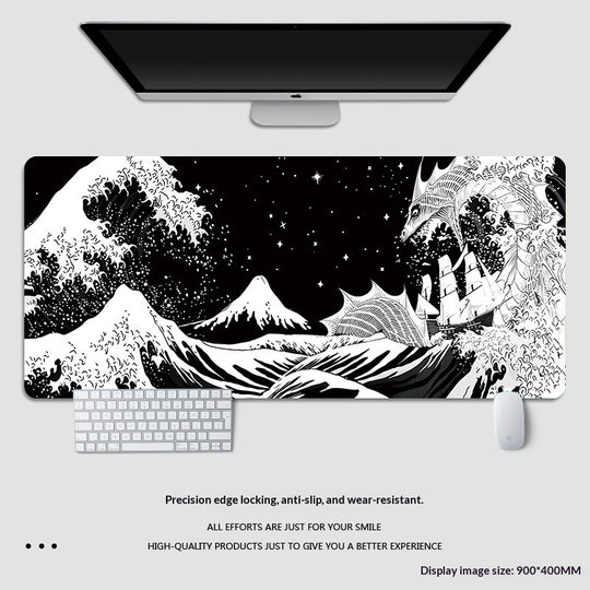 Large desk mat with dragon and mountain design on a white surface