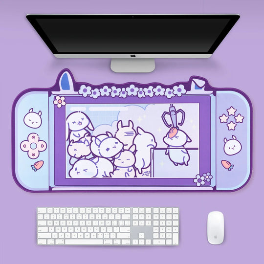 Purple cartoon-themed desk mat with a computer setup on a purple background